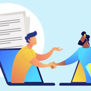 Two designers are discussing their work & shaking their hands.